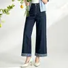 Diretamente do fabricante, jeans azul escuro de novo estilo com forro interno estampado, cós elástico nas costas, painéis laterais e barras dobradas