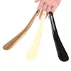 Extractor de zapatos pequeño de plástico para colgar, portátil, para viajes, artículos de primera necesidad para el hogar.