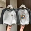 Camiseta Interior Térmica para Niños 2026 Otoño/Invierno Nueva Para Niños Cuello Redondo Polar Térmico Cálida Camiseta de Manga Larga con Parches