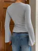 Camiseta base de manga larga con cuello redondo, estilo chica picante, de venta caliente en TK transfronterizo, con mangas de campana, entallada a la cintura, adelgazante y con dobladillo de volantes