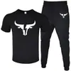 T-shirt Masculina de Manga Curta e Calça Suit Casual Venda Quente Transfronteiriça Gola Redonda Cor Lisa Roupa Esportiva Casual com Estampas e Impressão