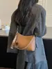 Bolsa feminina retrô de outono e inverno de grande capacidade 2026 nova tendência elegante e estilosa bolsa tote de ombro de camurça de alta qualidade