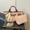 Bolso de Oficina Súper Popular para Mujer 2026 Nuevo Modelo Bolso de Hombro Cruzado para Viajes con un Toque de Lujo, Bolso Cubo Estilo Cesta