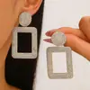 Pendientes redondos huecos exagerados transfronterizos, pendientes circulares de diseño creativo de moda retro para mujer, pendientes de estilo europeo y americano al por mayor