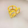 Anillo abierto elegante y ligero de lujo con incrustaciones de cristal K9 de alta calidad chapado en cobre de oro real de 18 quilates, estilo nuevo europeo y americano.