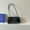 Bolso de axila de nicho de alta gama para mujer, nuevo bolso de hombro con lazo de verano 2026, bolso de mano moderno y versátil