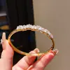 Pulsera de Lujo Ligero con Piedra Ojo de Gato de Zirconia y Hebilla Irregular Cuadrada de Bambú, Accesorio de Mano de Moda de Gama Alta y Elegante, Nicho para Mujeres