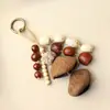 Cascabel de Concha de Fruta con Cadena de Semillas Retro Naturales que Cumplen Deseos Llavero de Semilla de Bodhi Colgante de Estilo Étnico Tejido a Mano para Bricolaje