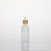 Botella de vidrio engrosado con gotero circular de bambú esmerilado de 5 a 100 ml para aceites esenciales, esencias líquidas, cosméticos, subembotellada.