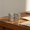 Anillo de Plata de Ley 925 Estilo Chino Nuevo Temperamento Retro Alto Grado Diseño Hueco Sentido de Diseño Anillo de Dedo de Superficie Ancha Apertura Ajustable Flor de Loto Entrelazada