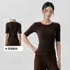 Nueva camiseta de yoga transfronteriza para mujer, corta de cuello redondo, manga de tres cuartos, top de fitness, manga corta deportiva adelgazante para Pilates