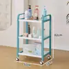 Carro de belleza estilo europeo multifuncional para salón de belleza carro de herramientas de tres capas con cajón estante de almacenamiento móvil
