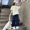 Conjunto de Verano para Niñas 2026 Nueva Moda Estilo Universitario Pantalones de Mezclilla de Manga Corta Conjunto de Dos Piezas para Estudiantes de Secundaria