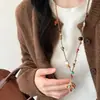 2025 Nova Corrente de Suéter com Pingente Longo de Franja Chinoiserie Outono e Inverno Novos Acessórios de Moda de Nicho Únicos para Mulheres