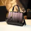 Bolsa Feminina de Couro Genuíno de Grande Capacidade, Modelo Novo 2026, Estilo Elegante de Moda para Mães com Compartimentos de Armazenamento Modernos