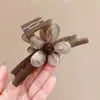 Pinza para el pelo de alta gama estilo coreano, pinza para el pelo de color block de dibujos animados para la parte trasera de la cabeza, pinza de tiburón grande versátil 2026 nueva para mujer