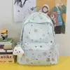 Bolso de hombro doble tipo estrella de alta gama con ambiente estilo bosque versión coreana moderno pequeño fresco estudiante ligero gran capacidad mochila escolar