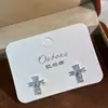 Brinco de Argola Cruzado Azul e Branco com Contraste de Cor e Design de Diamante, Estilo Niche Hot Girl, Sem Perfuração, Para Uso Diário, Acessório Moderno e Descolado para Mulheres