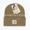 En Stock Etiqueta Tejida Multicolor de Textura Fina Transfronteriza Gorro de Punto Acrílico de Moda Gorro de Lana Gorro Frío Transfronterizo Caliente para Esquiar con Borde Enrollado