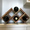 Rack de vinho decorativo de madeira maciça carbonizada atacado barato rack de vinho criativo rack de armazenamento de garrafas de vinho doméstico rack de vinho europeu