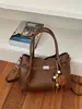 Bolso de cubo casual de moda transfronterizo 2025 otoño e invierno nuevo bolso de hombro con textura retro bolso de mano de personalidad bolso tote