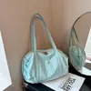 Bolso de hombro grande transfronterizo para mujer 2026 nuevo de moda versión coreana bolso tote para el trabajo color liso bolso de mano versátil bolso de hombro