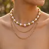 Set de collar retro anti-perla europeo y americano, cadena para clavícula en capas de acero de titanio de lujo ligero, accesorios versátiles personalizados al por mayor