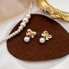 Pendientes de perla con lazo rosa, clip para la oreja, pendientes de moda que combinan con todo, pendientes personalizados de celebridades de Internet de Corea del Sur.