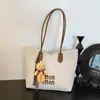 Bolsa de Ombro Casual Nicho Retrô de Grande Capacidade Feminina Nova Moda Outono 2025 e Bolsa Tote Prática para o Dia a Dia