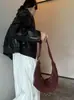 Bolso de bocina de gran capacidad retro de nicho para mujer, nuevo bolso tote para el trabajo de otoño/invierno 2026, bolso de hombro, bolso de axila, bolso cruzado