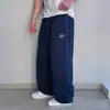 Pantalones de chándal casuales de pierna ancha para pareja con gancho de bordado suave, tela cálida suave y amigable con la piel, diseño simple, pantalones que realzan la altura y estilizan