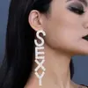 Pendientes de botón de cadena estilo europeo y americano, pendientes de alta gama de moda, pendientes personalizados, diseño de nicho, dulces, geniales, nuevos, pendientes populares
