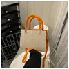 Bolso Tejido Estilo Bosque para Mujer 2026 Primavera/Verano Nuevo Modelo Pequeño Cuadrado para Viajes Diarios Bolsito Retro de Paja