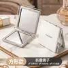 Espejo pequeño de doble cara para mujer, espejo de maquillaje portátil, mini espejo redondo plegable de alta gama de mano, con aumento, magnético, alta definición