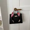 Bolsa retrô popular deste ano para mulheres 2026 nova moda bolsa transversal de verão para mulheres bolsa quadrada pequena texturizada