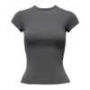 Camiseta feminina de verão de manga curta com design de ombro reto, acinturada e modeladora, corte sereia estilo coreano, caimento justo, top curto sexy, moda transfronteiriça