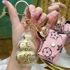 Bendición del Oficial Celestial Oro Puro 999 Llavero Calabaza para Teléfono Móvil Concha de Agua Mismo Estilo Adornos Dorados Pequeños Regalos Fabricante Venta al por Mayor