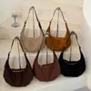 Bolso de hombro de gamuza de alta gama transfronterizo, bolso de axila, estilo retro Melard para mujer, bolso casual en forma de media luna, bolso cruzado versátil
