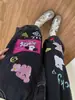 Shorts jeans retos pretos de cintura alta com estampa estilo americano para afinar o corpo, calças cropped estilo hot girl da moda de rua para o verão de 2026