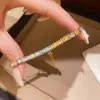 Pulsera ajustable de resina con trébol incrustado de diamantes, sensación de lujo ligero y alta gama, joyería de diseño elegante y versátil