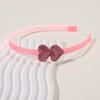 Europa y Estados Unidos nuevos accesorios para el cabello para niños bebé alta calidad color sólido amor diadema niñas diadema de cinta con forma de corazón al por mayor