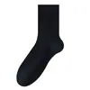 Calcetines de lana para hombre, de longitud media, cálidos, resistentes al olor, antipelusas, calcetines largos para otoño e invierno, nuevo modelo popular 2026, venta al por mayor desde la fábrica de Zhuji