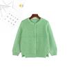 Suéter de punto de color sólido nuevo de otoño e invierno para niños y niñas, venta al por mayor al contado, cárdigan suéter Joker de un solo botón para niños