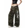 Pantalones casuales de camuflaje con estampado de letras de la alta calle americana para hombre y mujer, cintura elástica, corte holgado, pantalones deportivos versátiles de pierna ancha estilo japonés