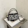 Bolsa de Bowling Retro Estampa de Leopardo Ombro Único Feminina 2026 Outono/Inverno Nova Elegante Versátil Bolsa de Mão para o Trabalho Transversal