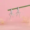 Brincos de zircônia em formato de laço totalmente cravejados para mulheres, elegantes e doces, luxo leve com um toque de alta qualidade, populares em transmissões ao vivo na internet, brincos super brilhantes