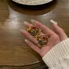 Brincos de pérolas artificiais redondas transversais de agulha de prata, brincos exagerados europeus e americanos femininos, brincos elegantes da moda, leves, luxuosos e sofisticados