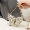 Bolsa Transversal Caixa Feminina Estilosa Borboleta Cor Sólida Metal Mini Estilo Novo Personalizado Moda Europeia e Americana 2025 Primavera