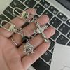 Llavero de Personalidad Nicho Pareja Fría Demonio Astronauta Aleación Colgante Bolso Estuche para Lápices Objetos Pequeños Decorativos