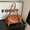 Bolsa de Mão Versátil Casual Simples Bolsa Baguete para Mulheres Outono 2025 Nova Textura de Alta Qualidade Luxo Leve Bolsa de Ombro/Axila